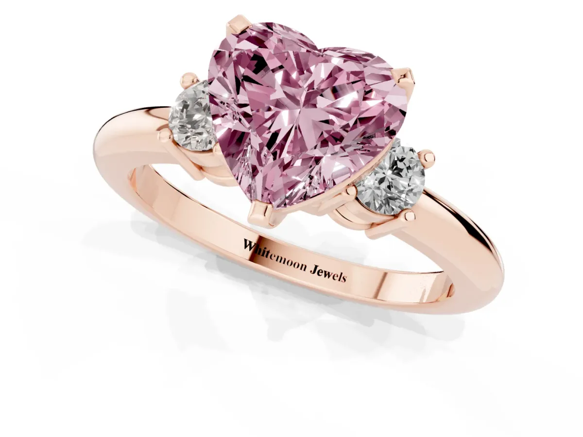 Fancy Pink Three-Stone Heart Cut Cut Diamond Solitaire with Prong Setting and Classic Band Rose gold