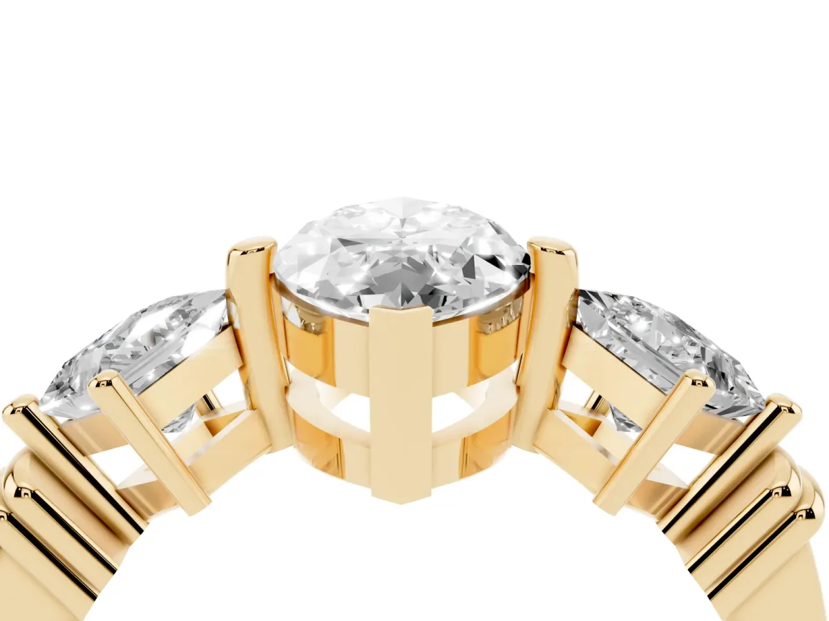 Three-Stone Marquise Cut and Princess Cut Diamond Ring with Channel Band and Four-Prong Setting Yellow gold