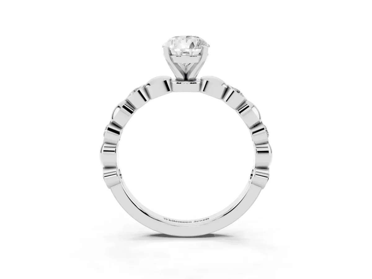 Pear Cut Solitaire Bezel-Set Diamond Ring with Beaded Band and Four-Prong Setting Silver