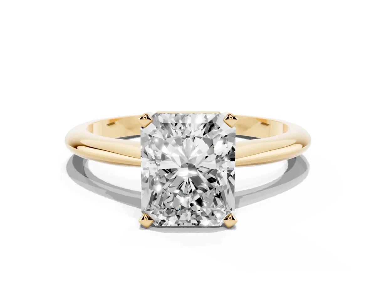 Radiant Cut Cut Solitaire Ring with Four-Prong Setting on a Classic Band Yellow gold