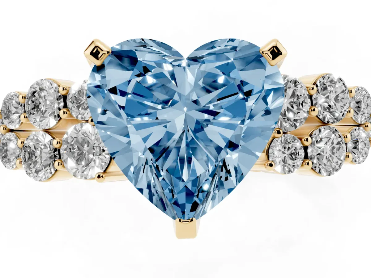 Fancy Blue Heart Cut Cluster Diamond Engagement Ring with Pavé Band and Four-Prong Setting Yellow gold
