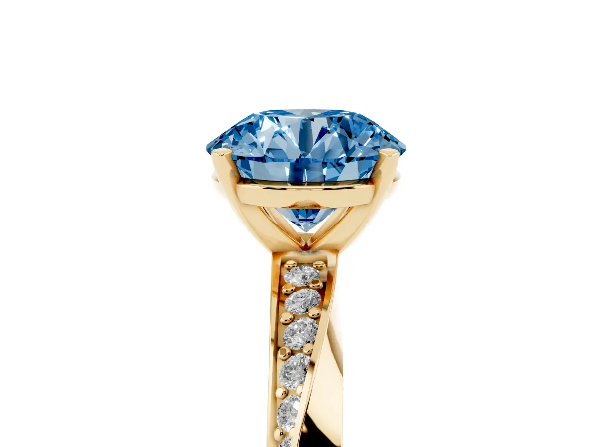 Fancy Blue Round Cut Diamond Engagement Ring with Side Stone Accents and Four-Prong Setting Yellow gold