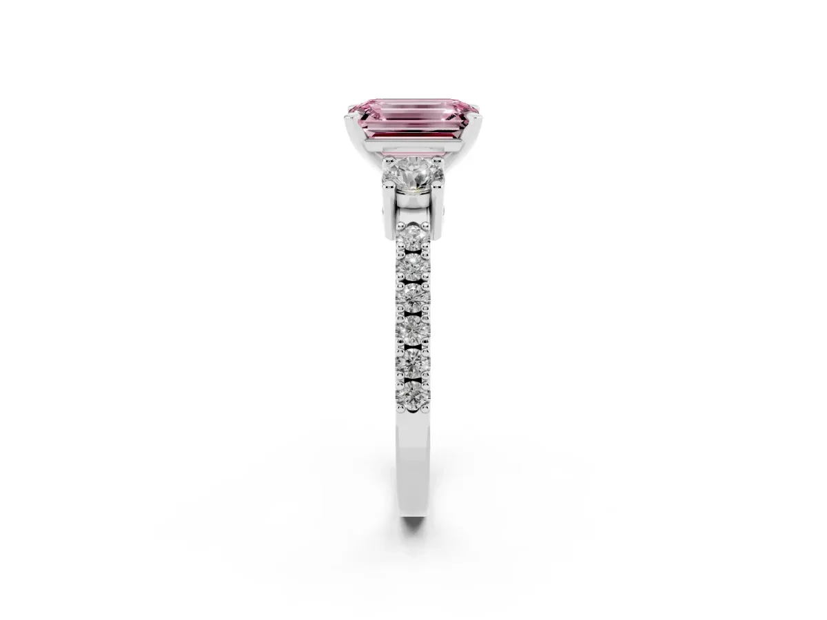 Fancy Pink Emerald Cut Three-Stone Diamond Pavé Band with Prong Setting Platinum