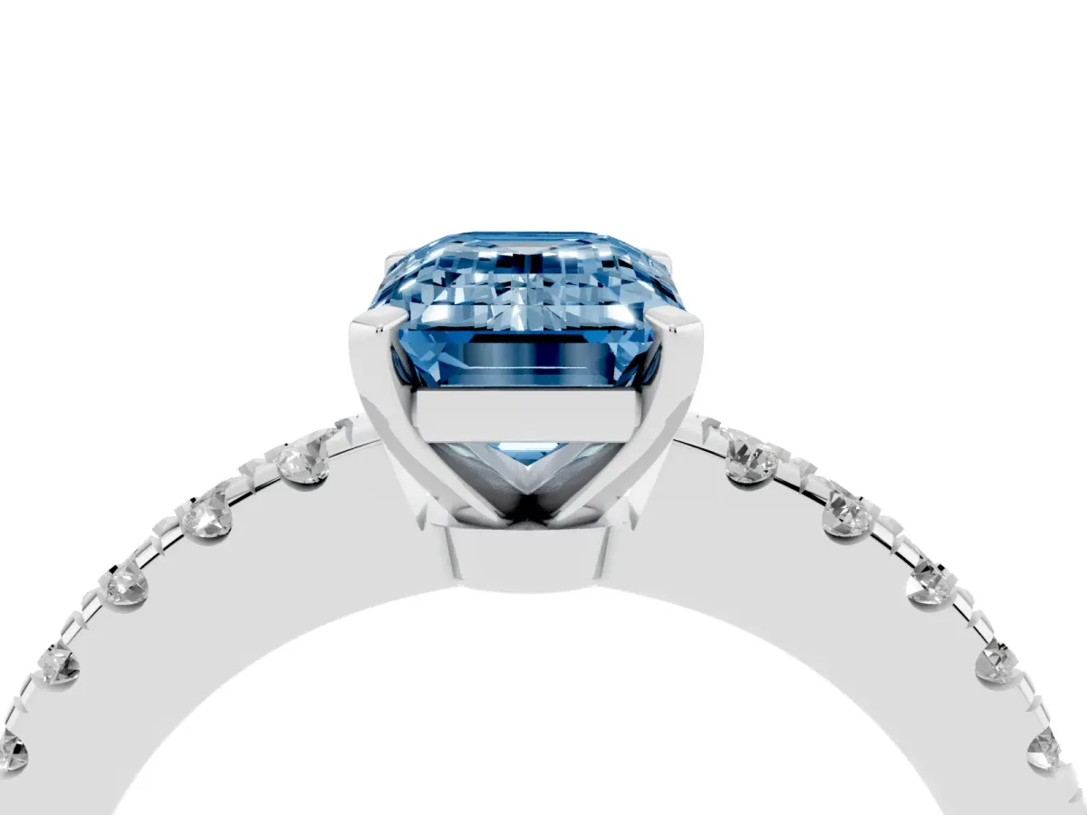 Fancy Blue Emerald Cut Solitaire Diamond with Pavé Band and Four-Prong Setting Silver