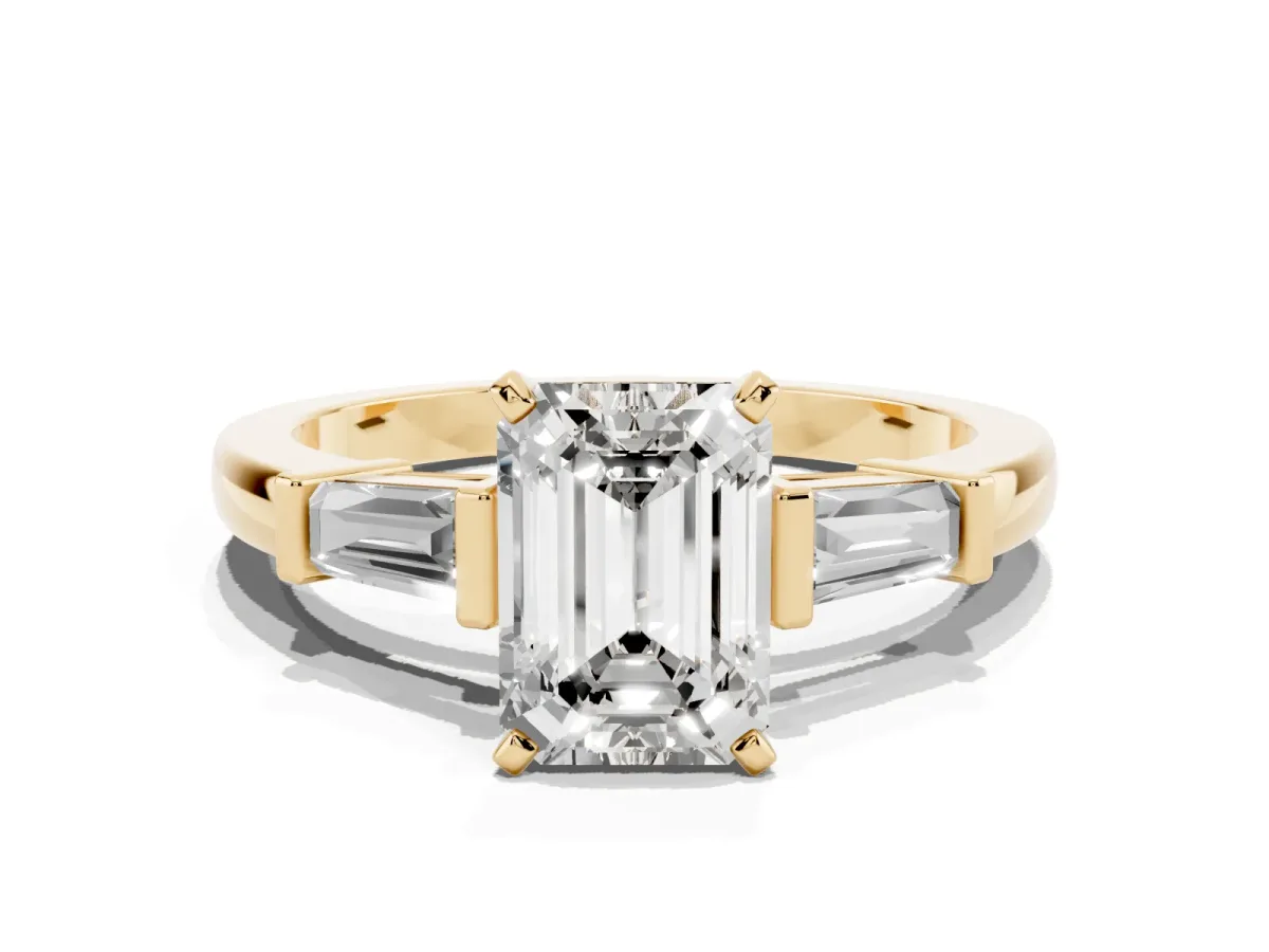 Emerald Cut Cut Diamond Solitaire Ring with Tapered Baguette Accents and Four-Prong Setting Yellow gold