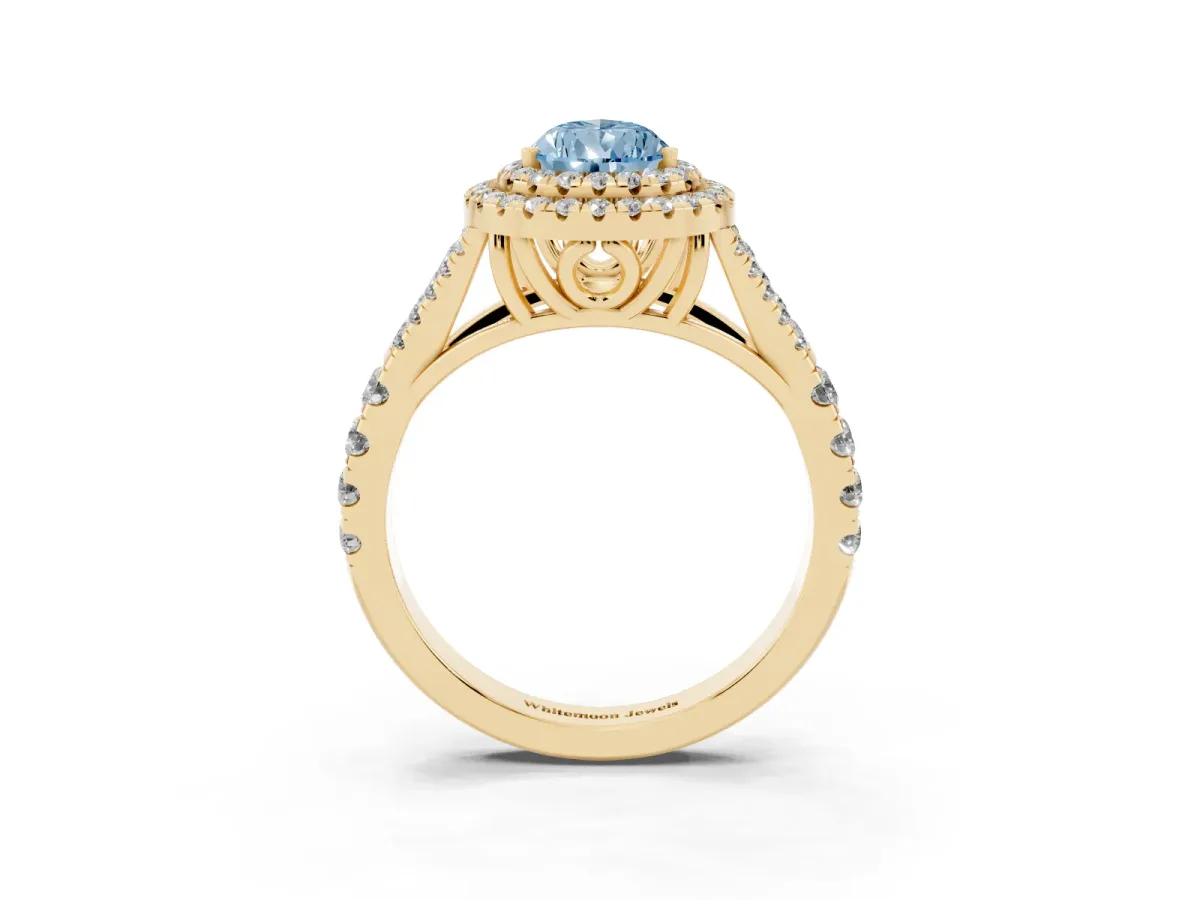 Fancy Blue Pear Cut Diamond Double Halo Ring with Split Shank and Prong Setting Yellow gold