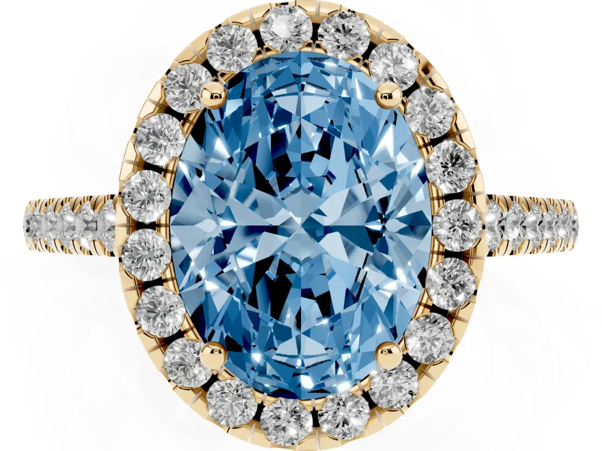 Fancy Blue Oval Cut Halo Pavé Diamond Engagement Ring with Four-Prong Setting Yellow gold
