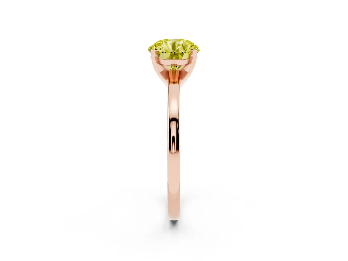 Fancy Yellow Round Cut Solitaire Diamond Engagement Ring with Four-Prong Setting on a Classic Band Rose gold
