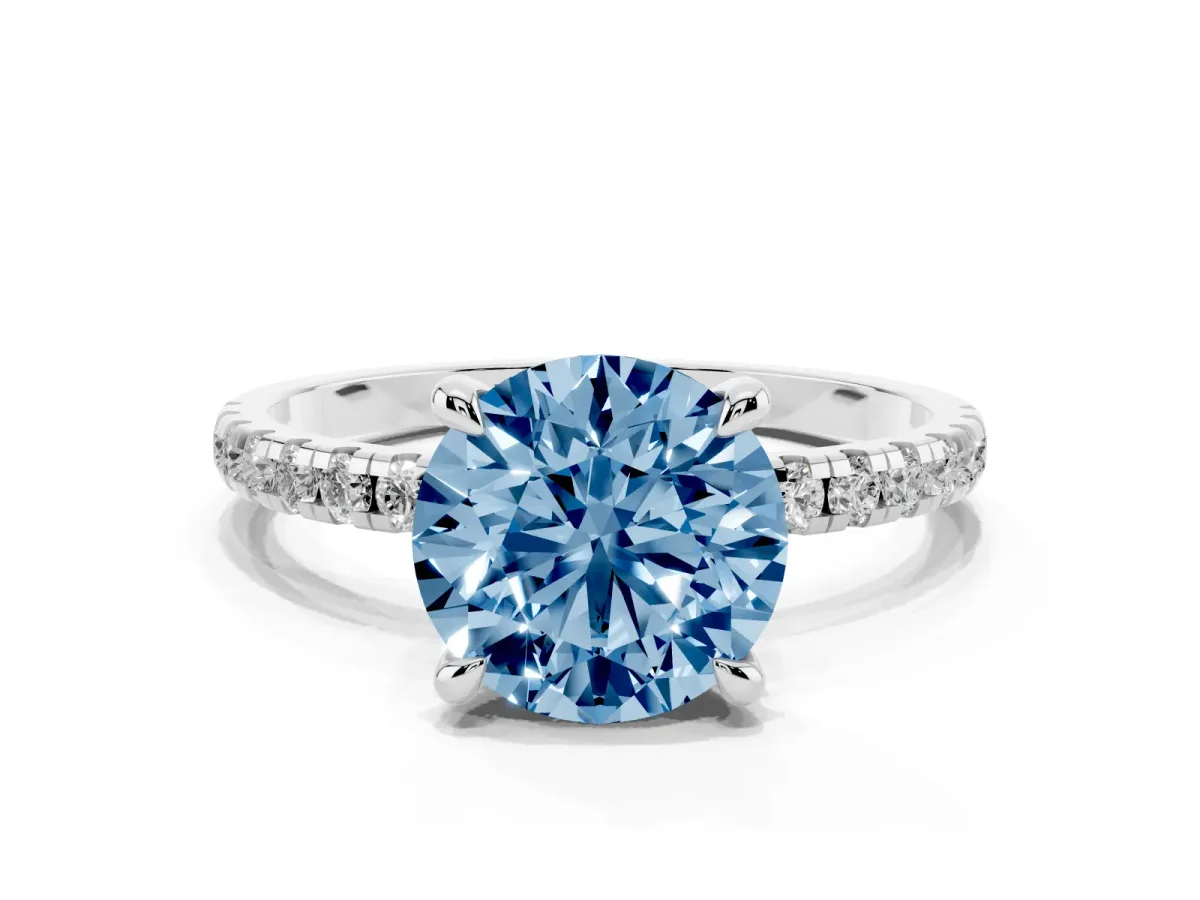 Fancy Blue Round Cut Diamond Brilliant Solitaire Ring with Pavé Band and Four-Prong Setting Platinum