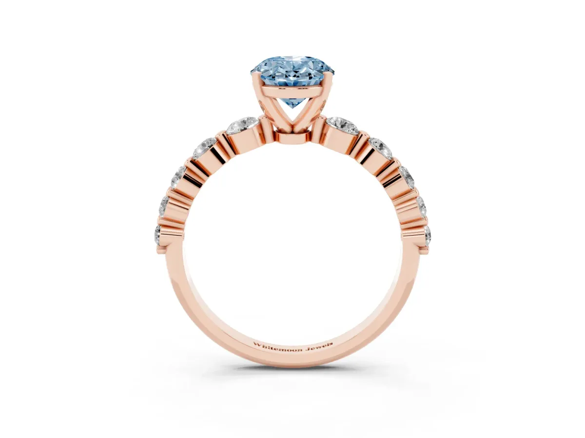 Fancy Blue Oval Cut Solitaire Diamond Ring with Pave Band and Four-Prong Setting Rose gold
