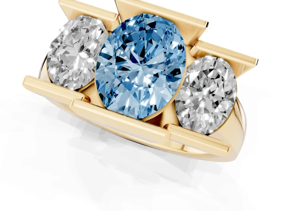 Fancy Blue Three Stone Oval Cut Cut Channel Set Diamond Ring Yellow gold