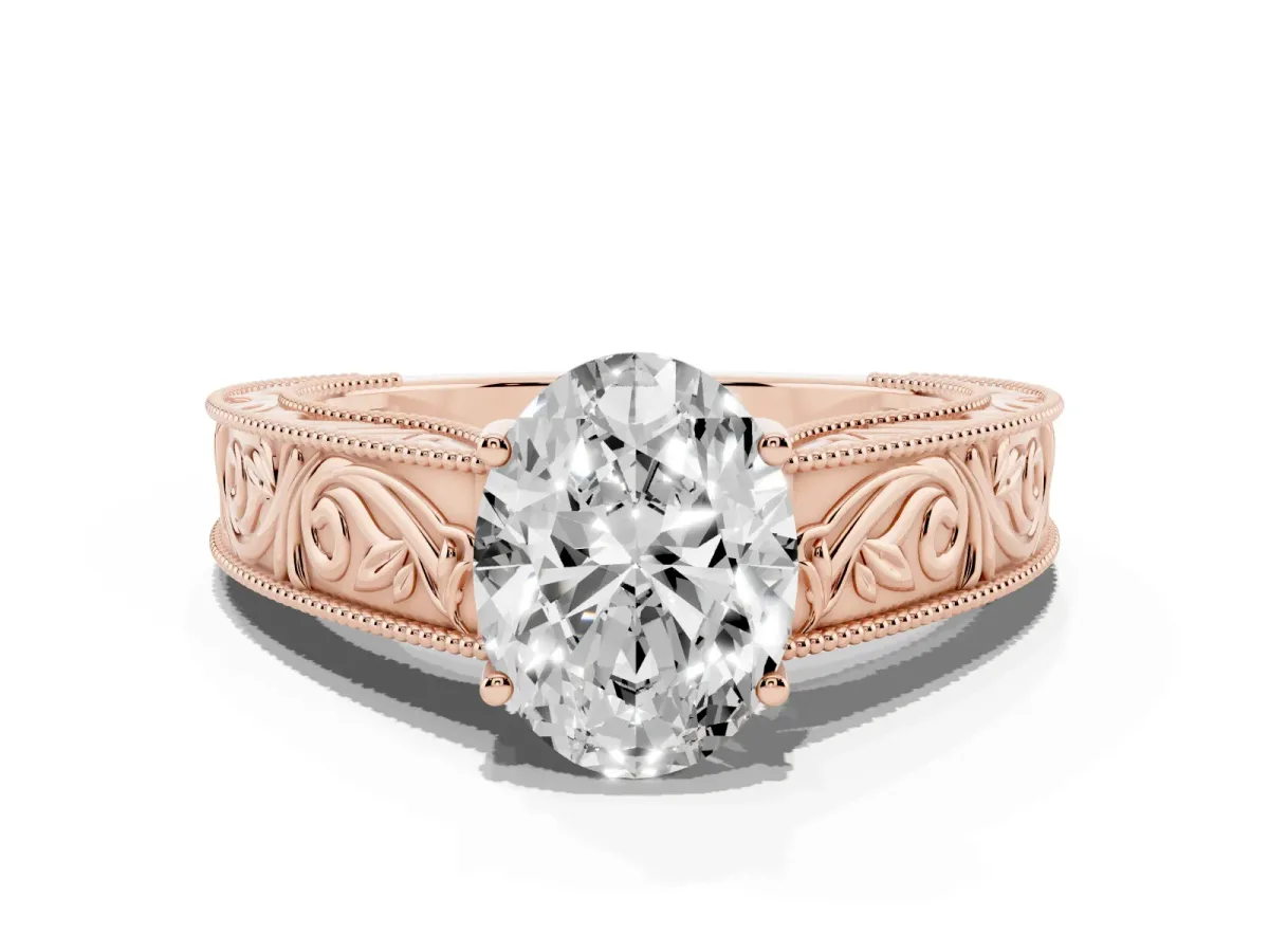 Oval Cut Diamond Solitaire Ring with Engraved Band and Four-Prong Setting Rose gold