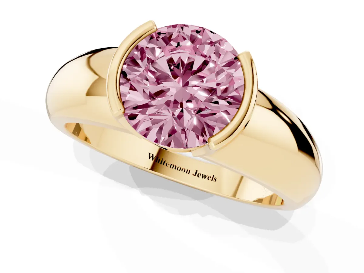 Fancy Pink Round Cut Solitaire Tension Set Diamond Ring with Wide Band Yellow gold