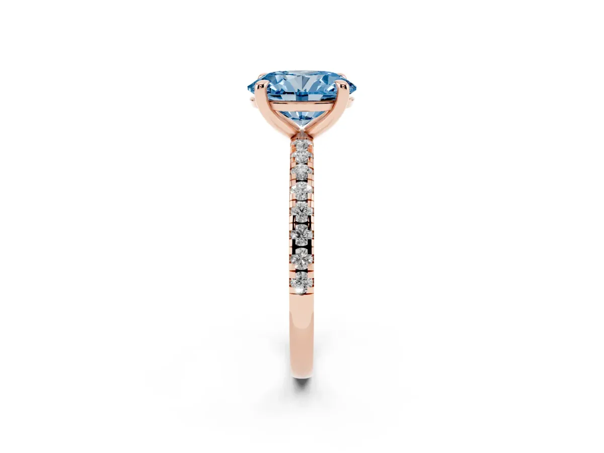 Fancy Blue Oval Cut Diamond Brilliant Solitaire Ring with Pavé Band and Four-Prong Setting Rose gold