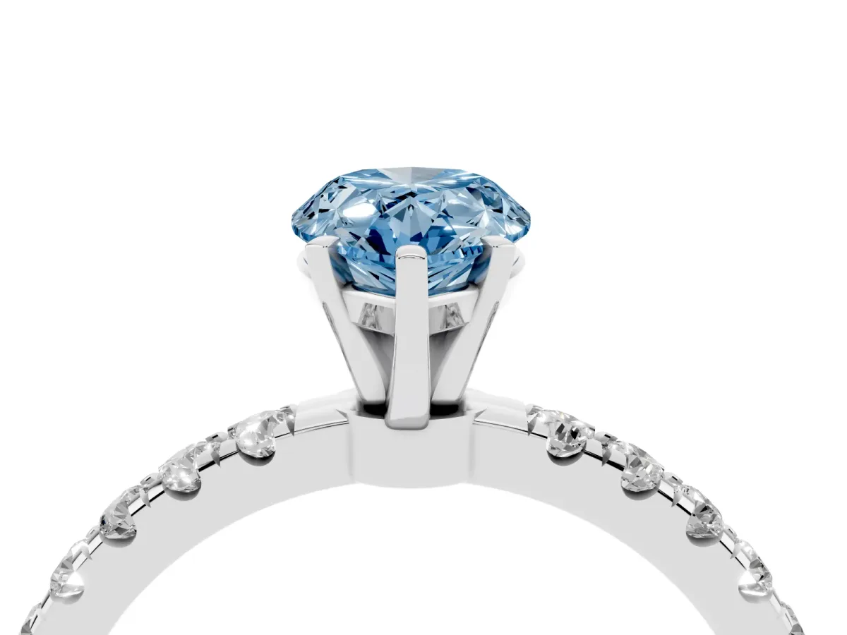 Fancy Blue Pear Cut Diamond Solitaire Ring with Pavé Accents and Four-Prong Setting Platinum