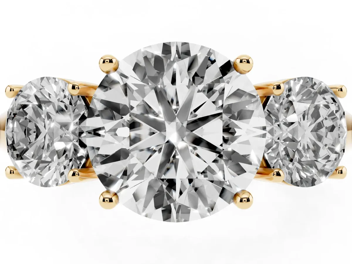 Three-Stone Round Cut Cut Diamond Engagement Ring with Prong Setting on a White Gold Band Yellow gold