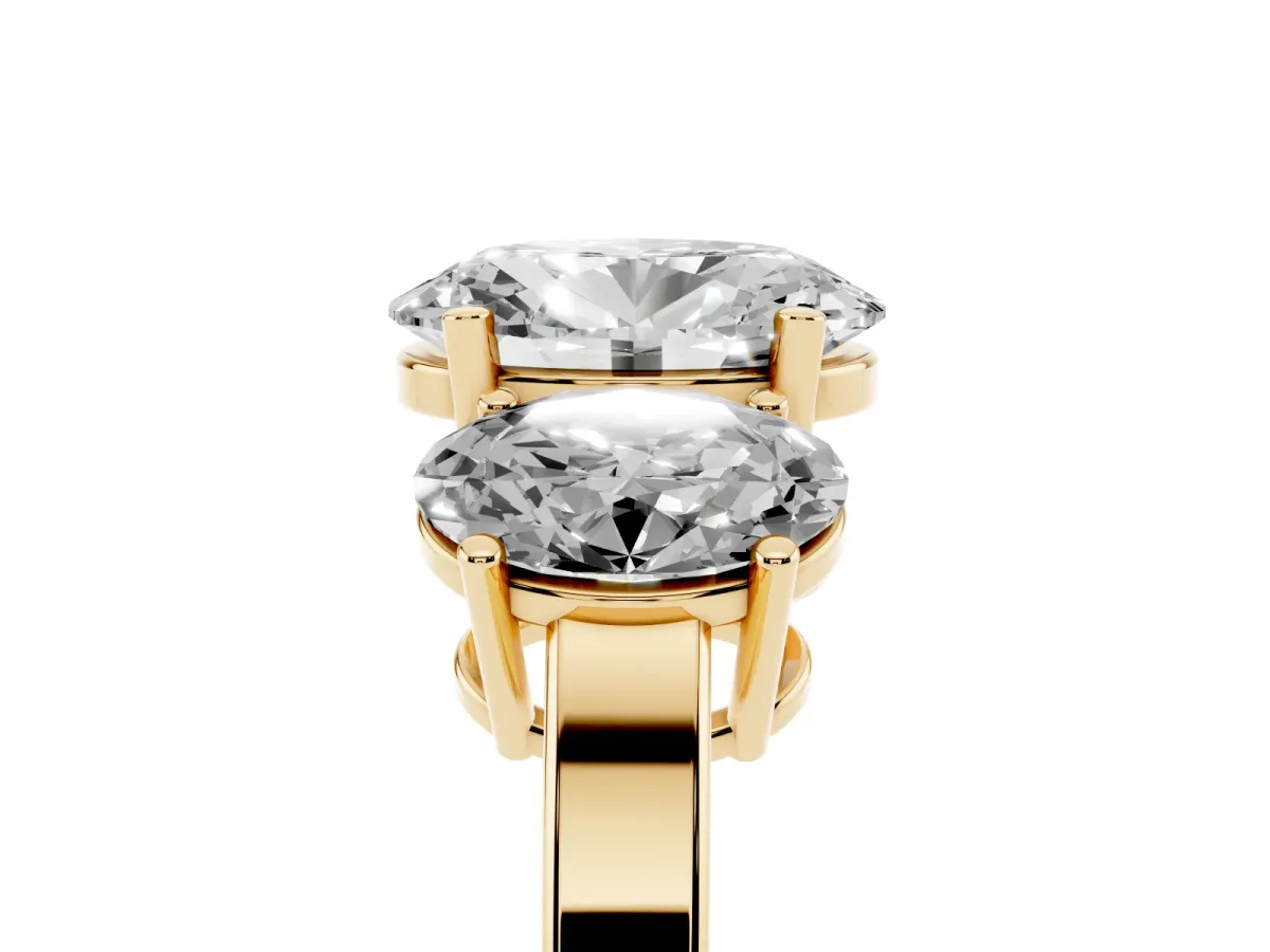 Three-Stone Oval Cut Cut Diamond Engagement Ring with Flat Band and Four-Prong Setting Yellow gold