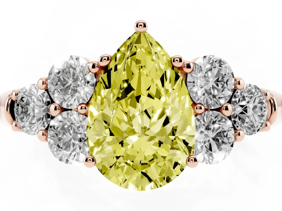 Fancy Yellow Pear Cut Cut Diamond Cluster Ring with Round Accent Stones and Prong Setting on a Classic Band Rose gold