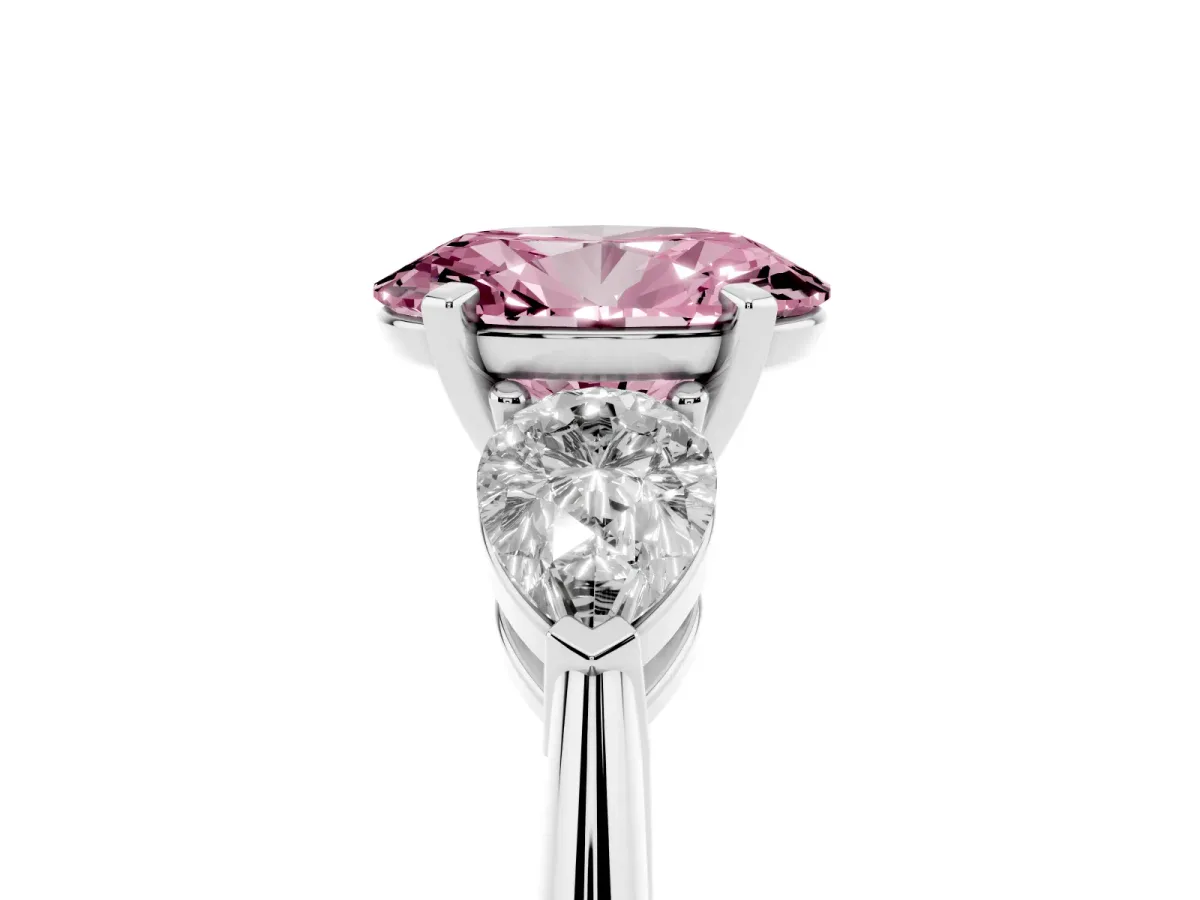 Fancy Pink Three-Stone Oval Cut Diamond Ring with Pear Side Stones and Four-Prong Setting Silver