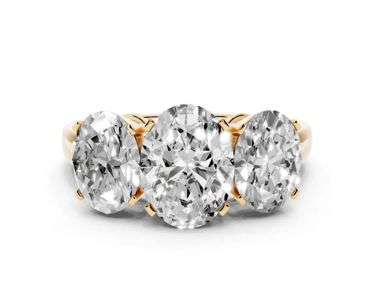 Three-Stone Oval Cut Cut Diamond Ring with Channel Set Band and Four-Prong Setting Yellow gold