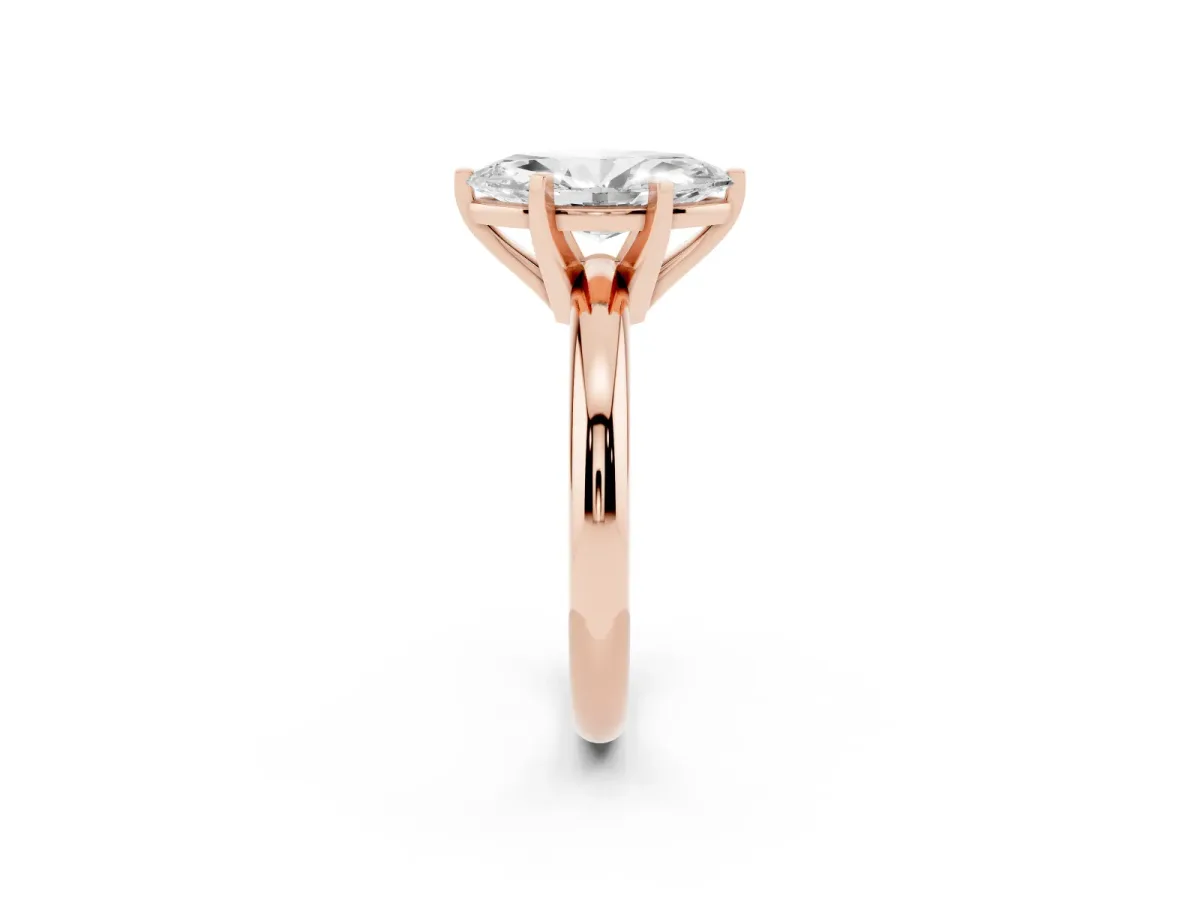 Marquise Cut Diamond Solitaire Engagement Ring with Round Band and Four-Prong Setting Rose gold