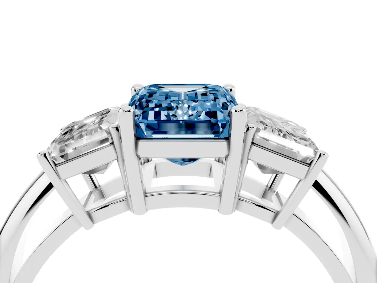 Fancy Blue Three-Stone Emerald Cut Cut Diamond Engagement Ring with Prong Setting on a White Gold Band White gold