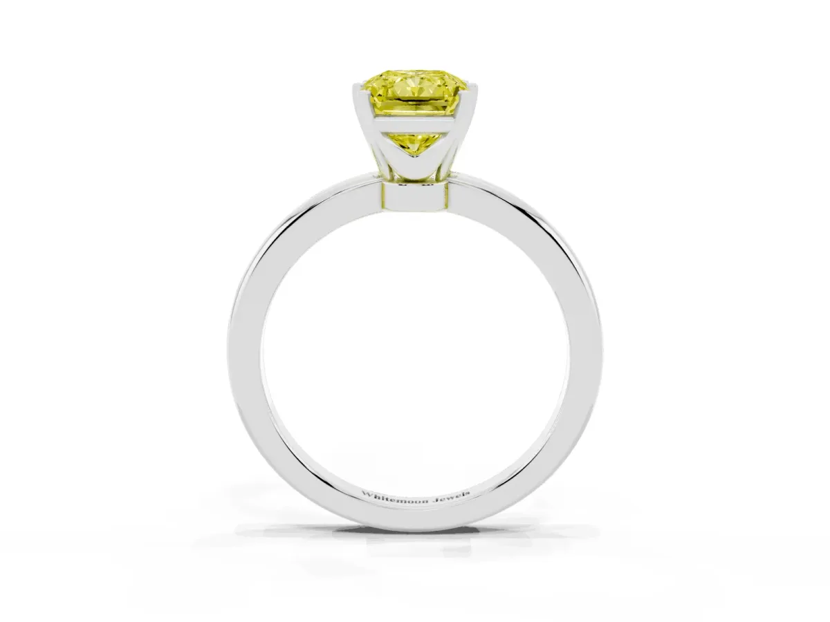 Fancy Yellow Radiant Cut Solitaire Diamond Ring with Six-Prong Setting on a Classic Band Silver