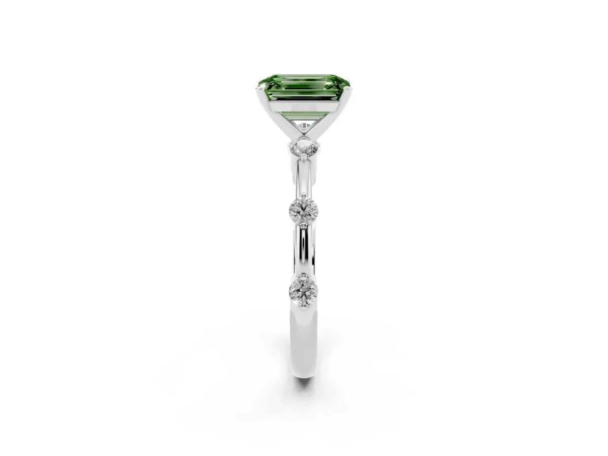 Fancy Green Emerald Cut Solitaire Diamond Ring with Bezel Set Side Stones and Prong Setting Silver