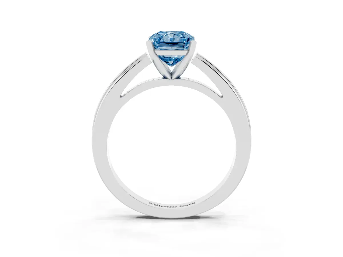 Fancy Blue Radiant Cut Solitaire Diamond Ring with Four-Prong Setting and Classic Band Platinum