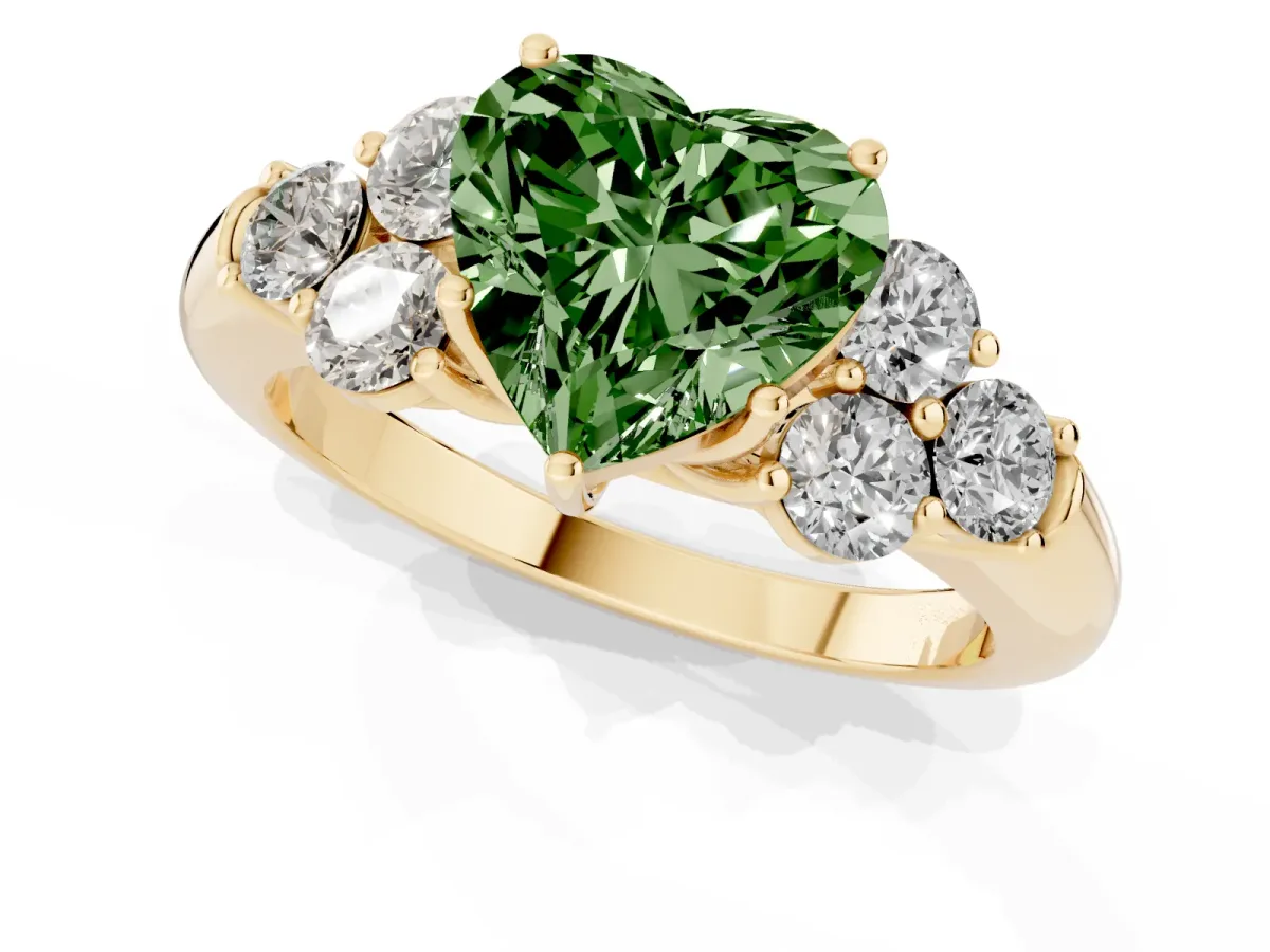 Fancy Green Heart Cut Cut Diamond Cluster Ring with Round Accent Stones and Prong Setting on a Classic Band Yellow gold
