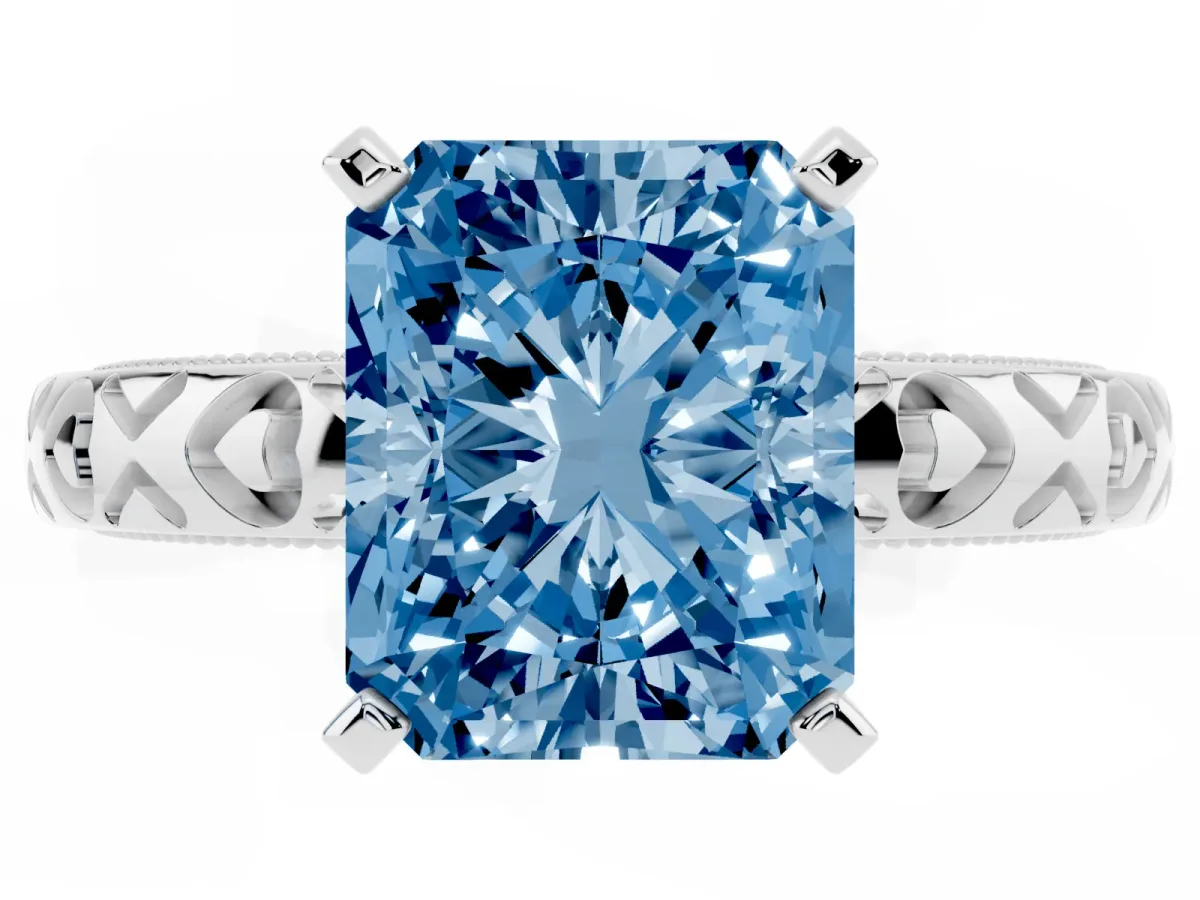 Fancy Blue Radiant Cut Solitaire Diamond Engagement Ring with XO Engraved Band and Four-Prong Setting Silver