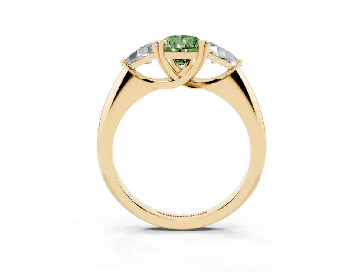 Fancy Green Three-Stone Pear Cut Diamond Engagement Ring with Trillion Side Stones and Prong Setting Yellow gold
