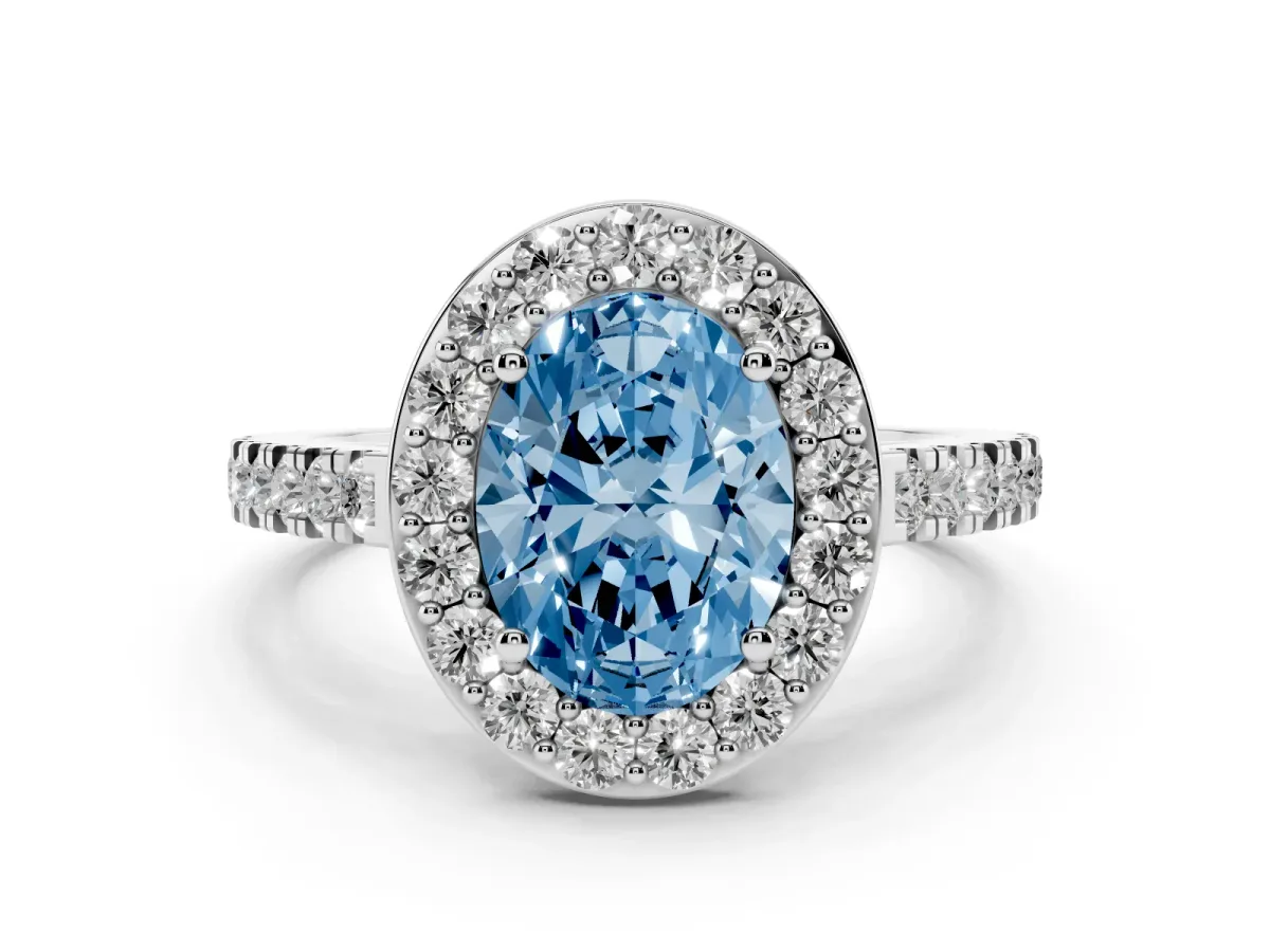 Fancy Blue Oval Cut Diamond Halo Ring with Round Pavé Split Shank and Prong Setting Platinum