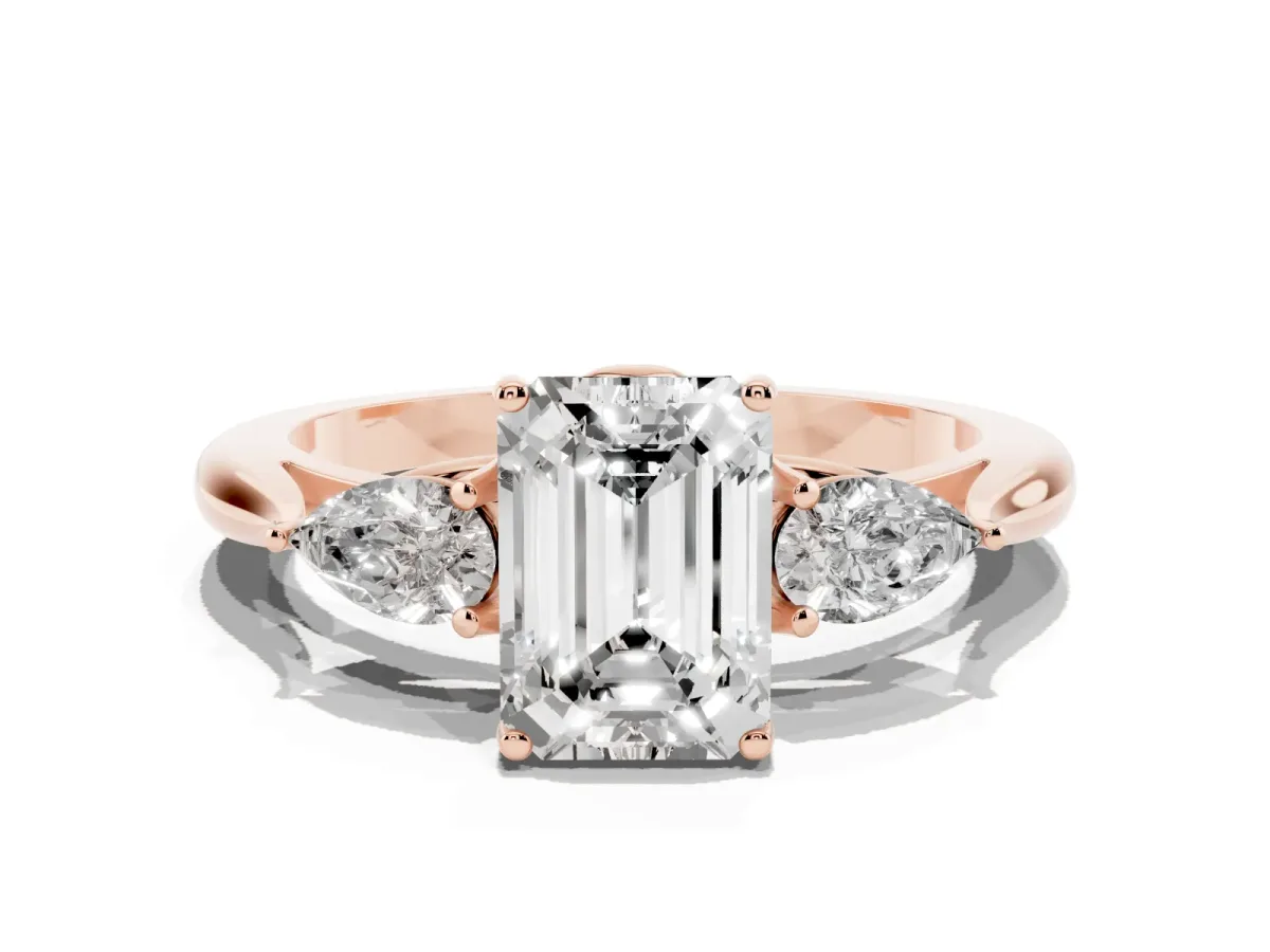 Three-Stone Emerald Cut Brilliant Diamond Solitaire Ring with Tapered Band and Four-Prong Setting Rose gold