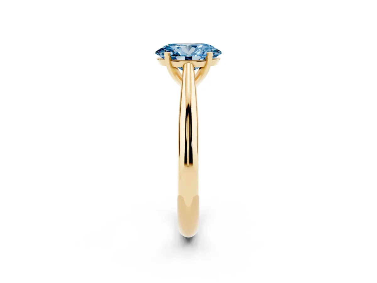 Fancy Blue Oval Cut Diamond Solitaire Engagement Ring with Cathedral Setting and Four-Prong Mount Yellow gold