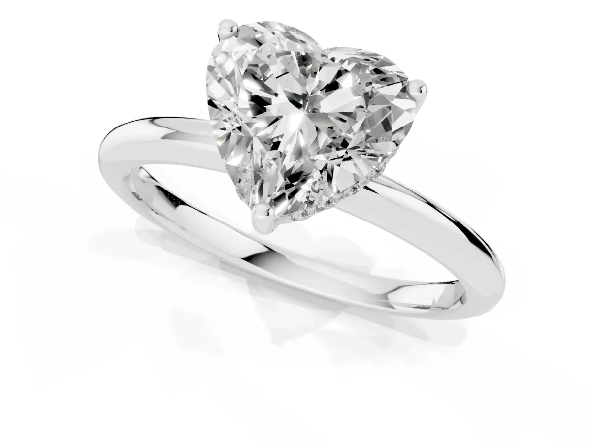 Heart Cut Cut Solitaire Engagement Ring with Four-Prong Setting and Classic Band Silver
