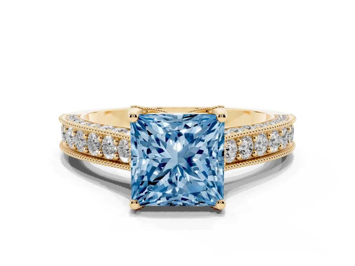 Fancy Blue Princess Cut Cut Diamond Solitaire Ring with Milgrain Pave Band and Four Prong Setting Yellow gold