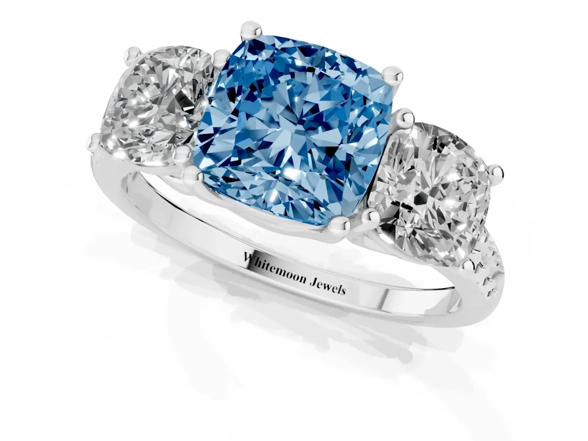 Fancy Blue Three-Stone Cushion Cut Diamond Ring with Round Pavé Band and Prong Setting Silver