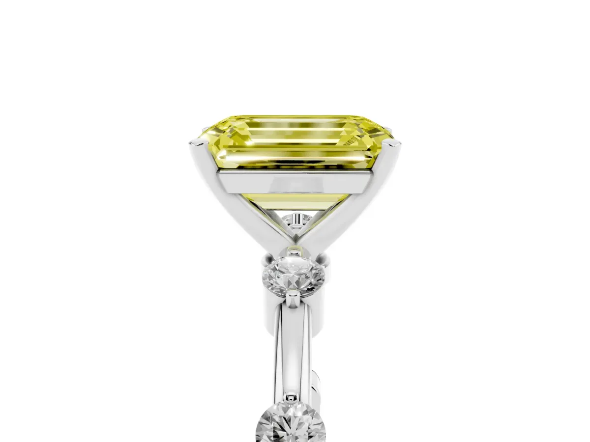Fancy Yellow Emerald Cut Solitaire Diamond Ring with Bezel Set Side Stones and Prong Setting Silver