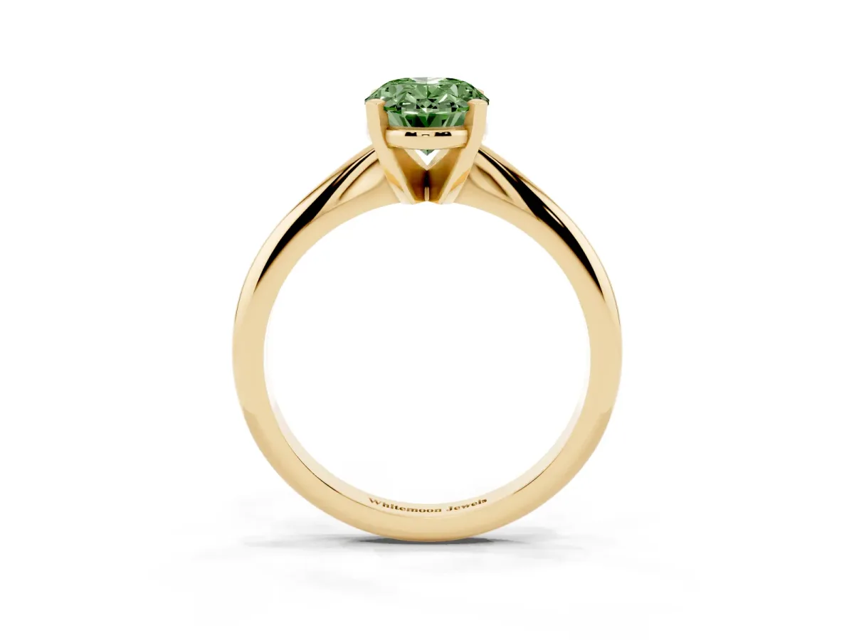 Fancy Green Oval Cut Cut Solitaire Ring with Four-Prong Setting on a Classic Band Yellow gold