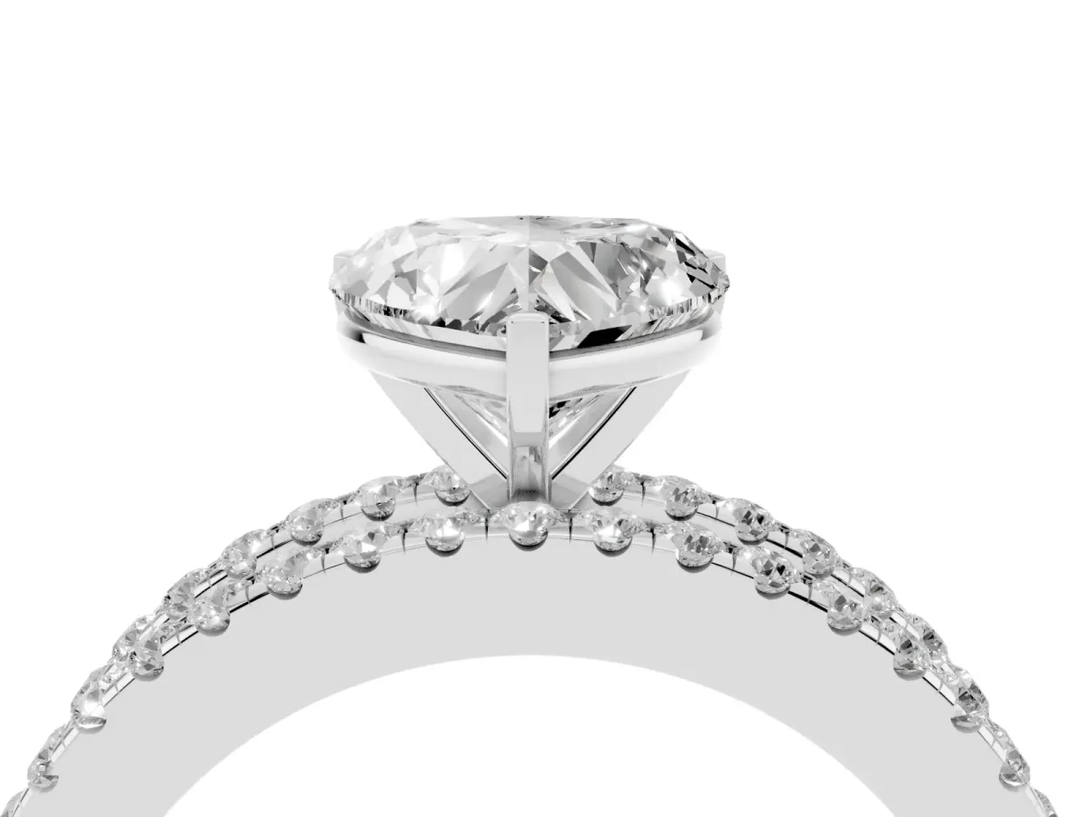 Heart Cut Diamond Solitaire Ring with Pavé and Channel Set Band Platinum