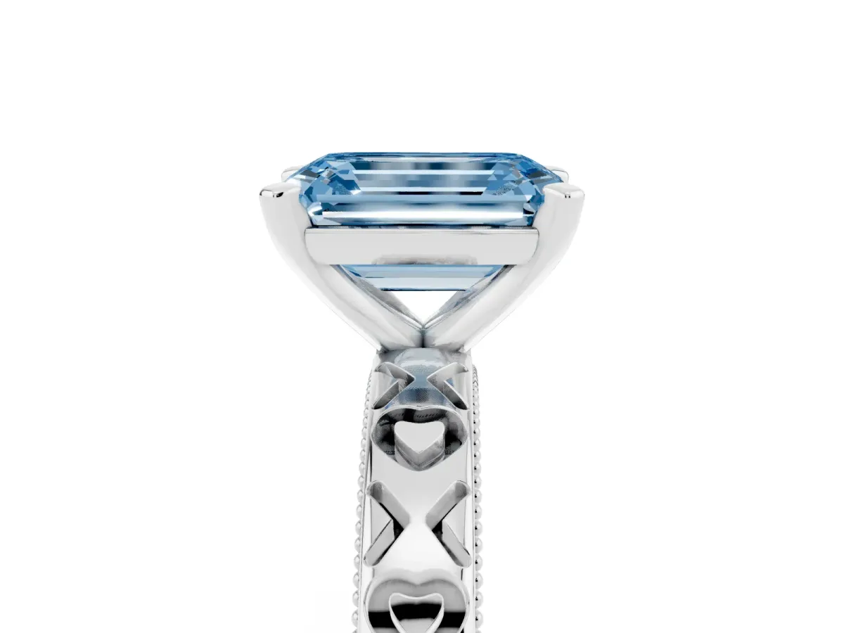 Fancy Blue Emerald Cut Solitaire Diamond Engagement Ring with XO Engraved Band and Four-Prong Setting Silver