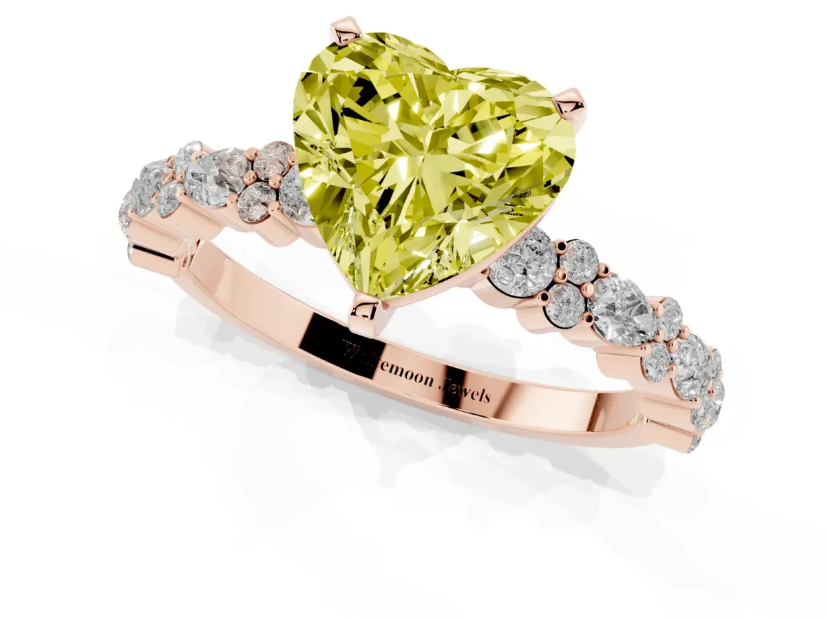 Fancy Yellow Heart Cut Diamond Side Stone Solitaire Ring with Round and Four-Prong Setting Rose gold