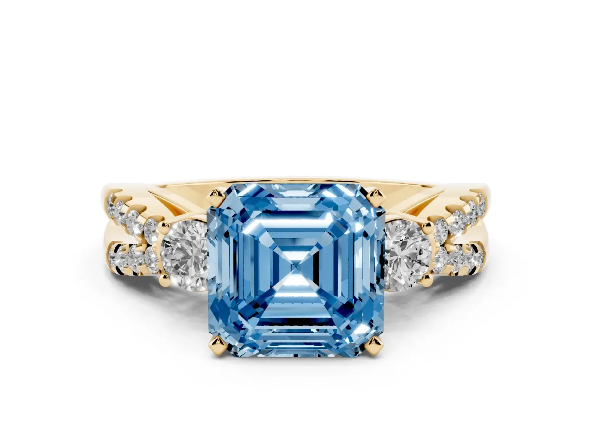 Fancy Blue Asscher Cut Diamond Three-Stone Ring with Pavé Split Shank and Four-Prong Setting Yellow gold