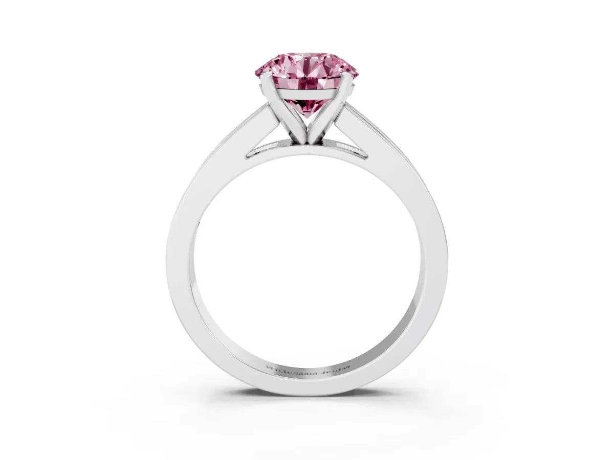 Fancy Pink Round Cut Solitaire Diamond Ring with Channel-Set Band and Four-Prong Setting Silver