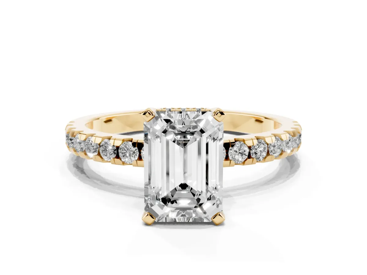 Emerald Cut Diamond Solitaire Ring with Round Pavé Band and Four-Prong Setting Yellow gold