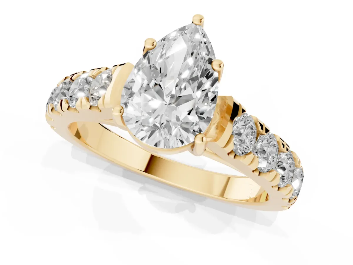 Pear Cut Cut Diamond Solitaire Ring with Micro Pave Band and Prong Setting Yellow gold