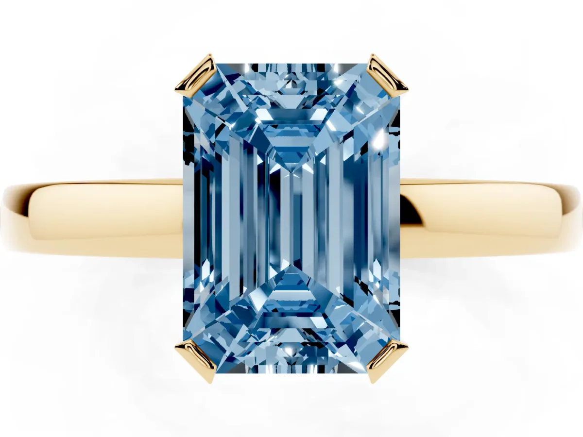 Fancy Blue Emerald Cut Cut Solitaire Ring with Four-Prong Setting and Classic Band Yellow gold