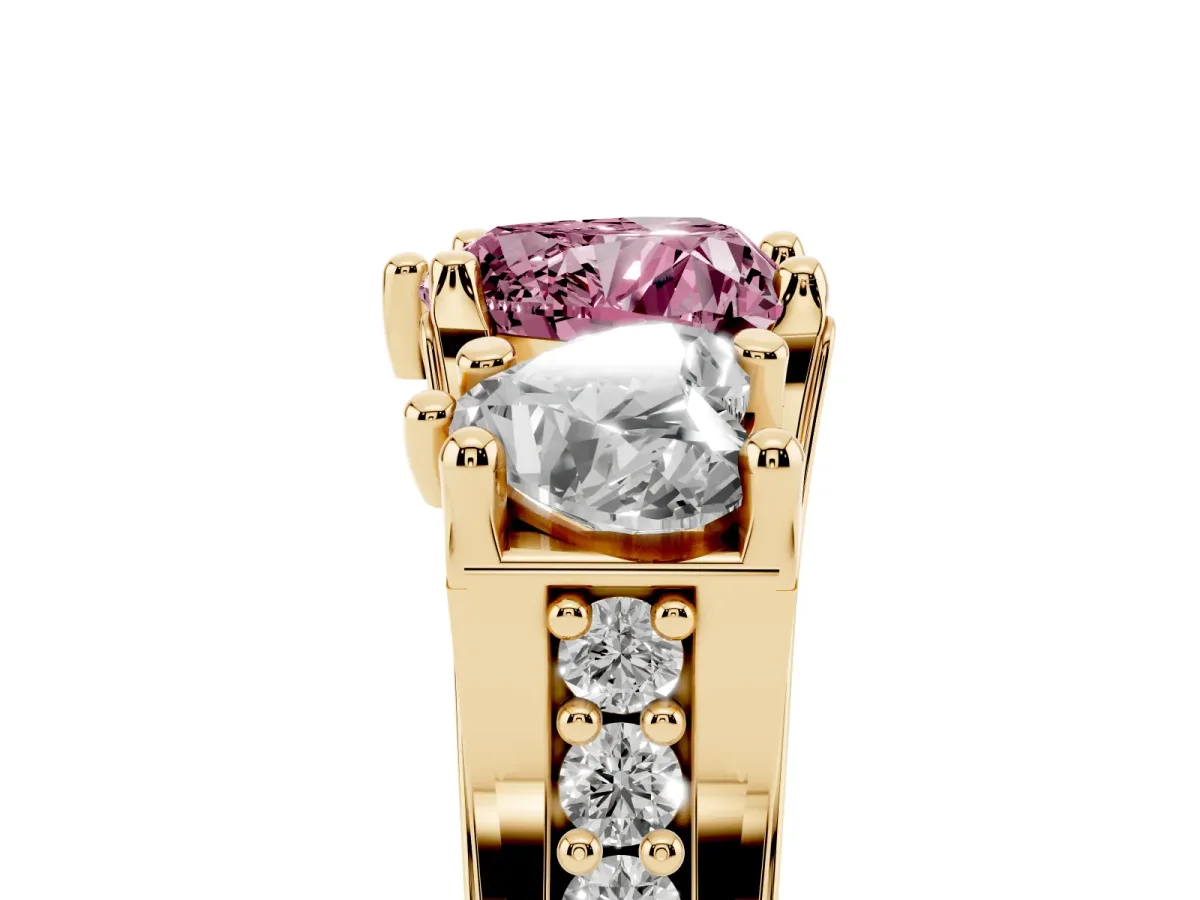 Fancy Pink Heart Cut Diamond Three-Stone Ring with Channel Set Band and Four-Prong Setting Yellow gold