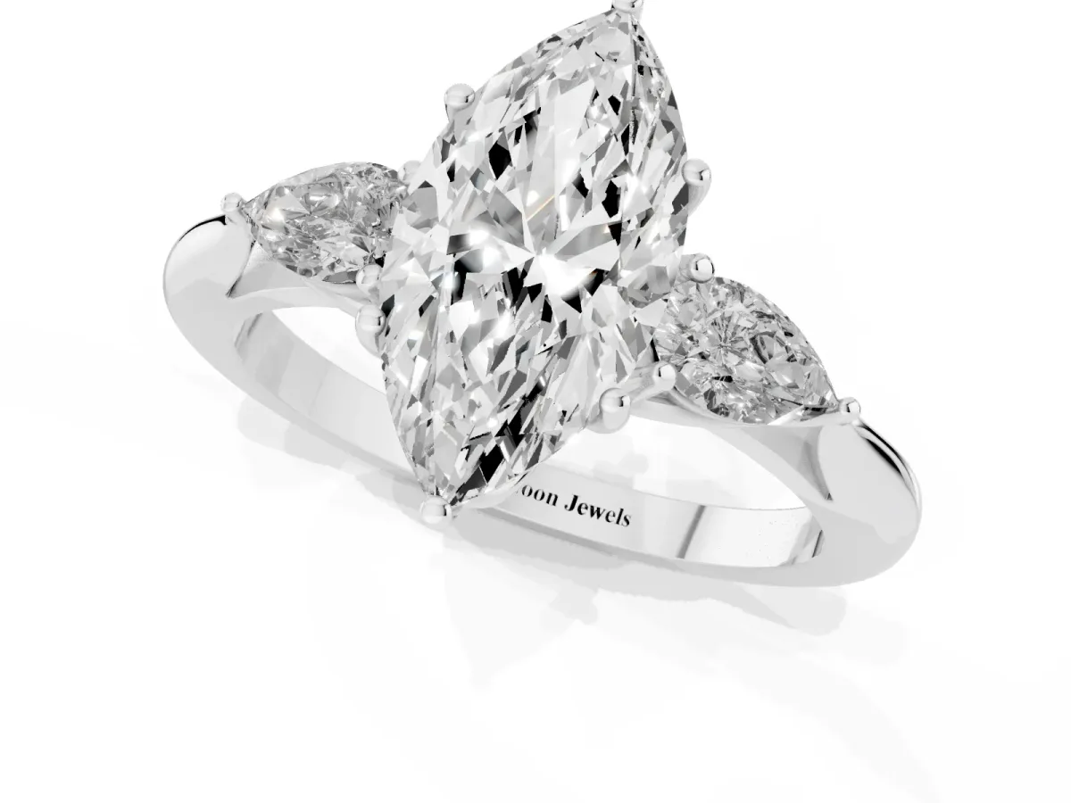 Three-Stone Marquise Cut Brilliant Diamond Solitaire Ring with Tapered Band and Four-Prong Setting White gold